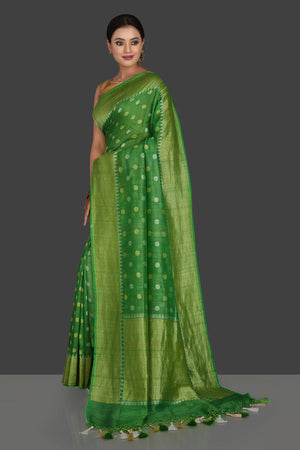 Buy beautiful light green tassar georgette Banarsi sari online in USA with zari border. Radiate elegance with georgette sarees, Banarasi sarees, handwoven sarees from Pure Elegance Indian fashion boutique in USA. We bring a especially curated collection of ethnic sarees for Indian women in USA under one roof!-pallu