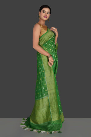 Buy beautiful light green tassar georgette Banarsi sari online in USA with zari border. Radiate elegance with georgette sarees, Banarasi sarees, handwoven sarees from Pure Elegance Indian fashion boutique in USA. We bring a especially curated collection of ethnic sarees for Indian women in USA under one roof!-side