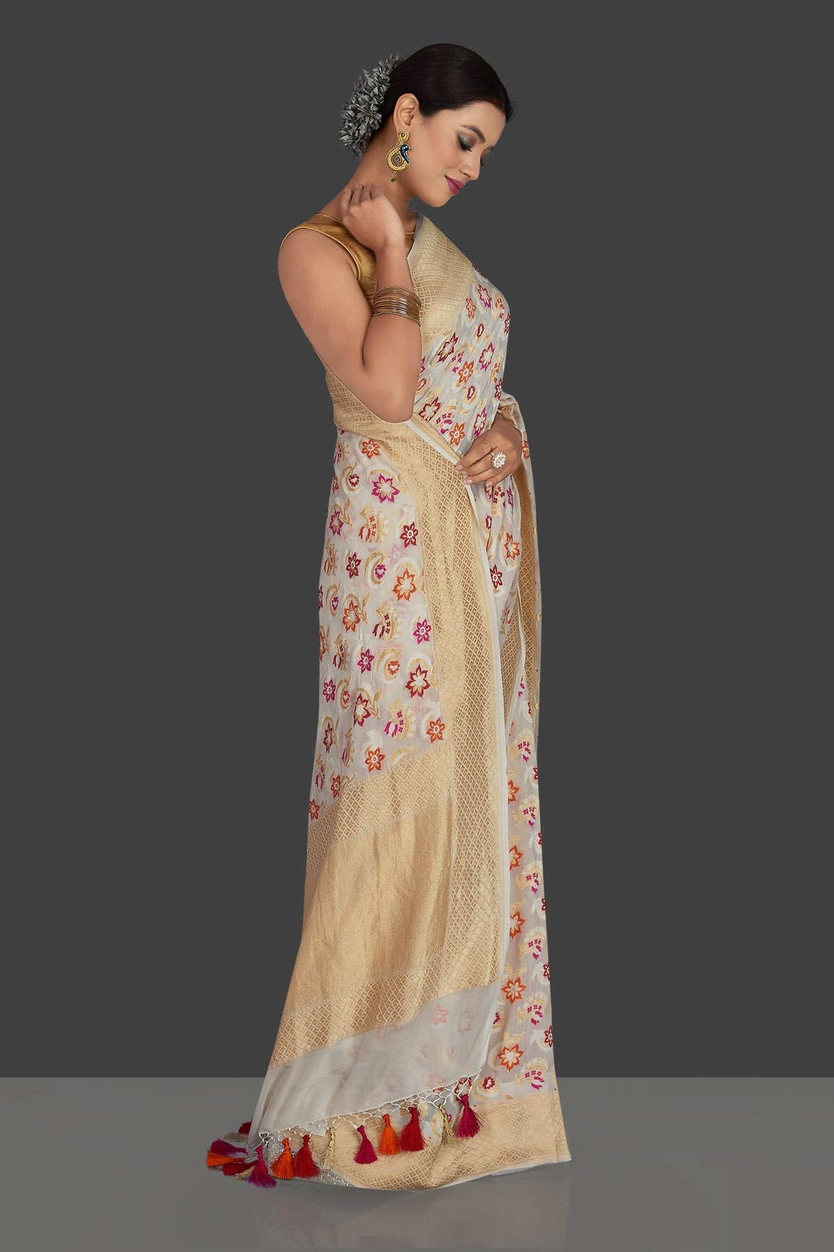 Buy beautiful cream georgette Banarasi sari online in USA with zari minakari floral work. Radiate elegance with georgette sarees, Banarasi sarees, handwoven sarees from Pure Elegance Indian fashion boutique in USA. We bring a especially curated collection of ethnic sarees for Indian women in USA under one roof!-right