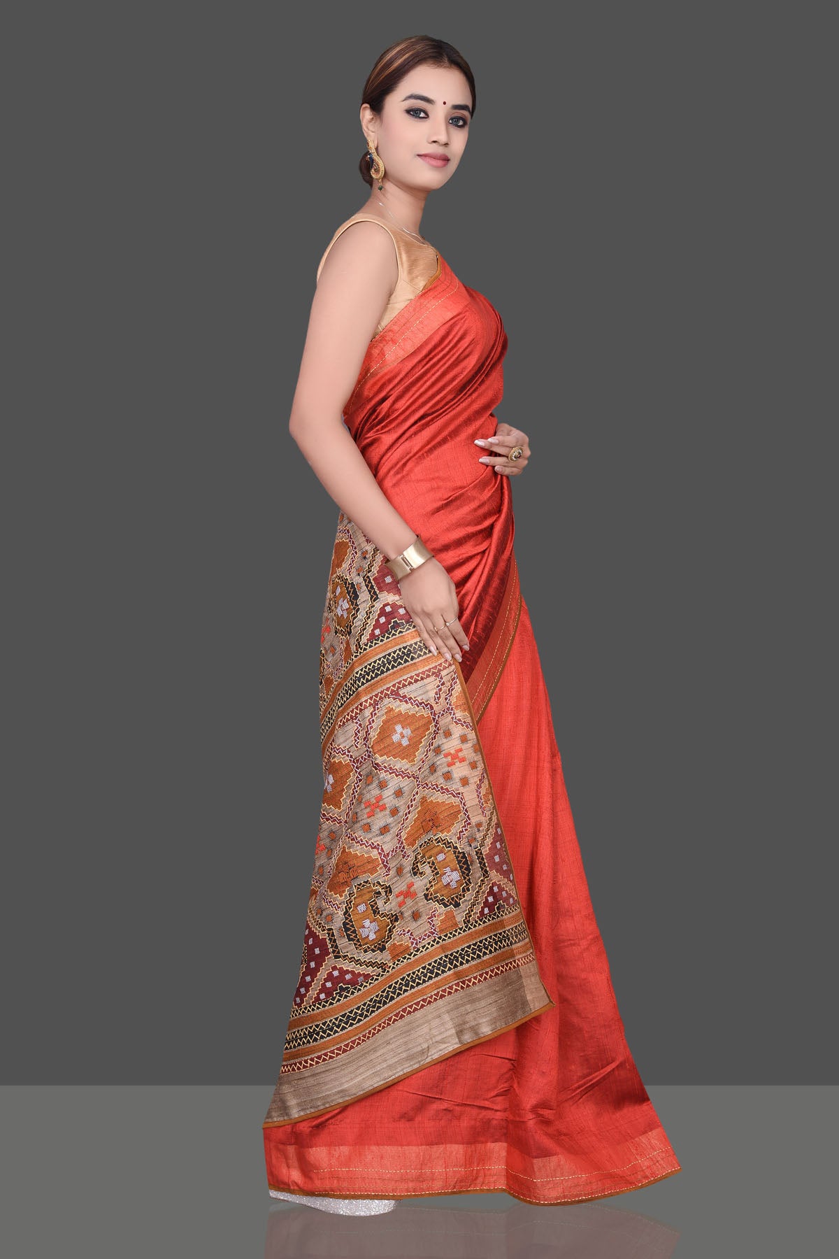 Buy beautiful brick red Kantha work raw silk sari online in USA. Shop beautiful silk sarees, hand embroidered saris, georgette sarees, designer sarees in USA from Pure Elegance Indian fashion store in USA. Shop online now.-side