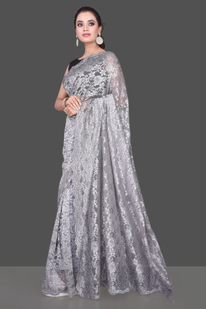 Shop beautiful light grey stone work designer lace saree online in USA. Be the talk of the parties and special occasions with stunning embroidered sarees, designer saris, pure silk sarees, fancy sarees from Pure Elegance Indian fashion store in USA.-pallu