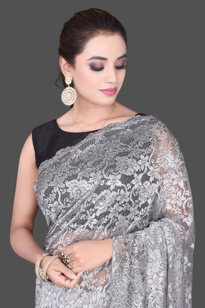 Shop beautiful light grey stone work designer lace saree online in USA. Be the talk of the parties and special occasions with stunning embroidered sarees, designer saris, pure silk sarees, fancy sarees from Pure Elegance Indian fashion store in USA.-closeup