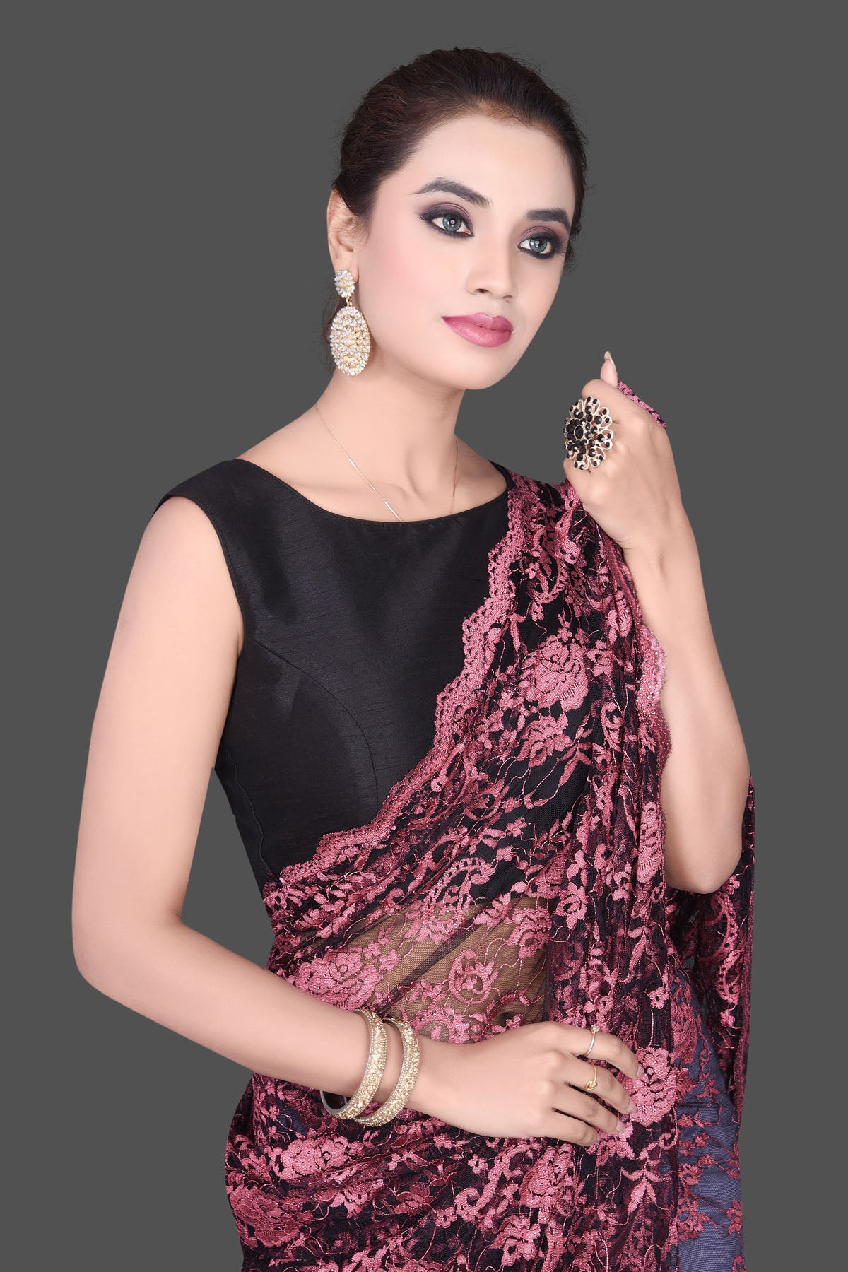 Shop gorgeous pink stone work designer lace saree online in USA. Be the talk of the parties and special occasions with stunning embroidered sarees, designer saris, pure silk sarees, fancy sarees from Pure Elegance Indian fashion store in USA.-closeup