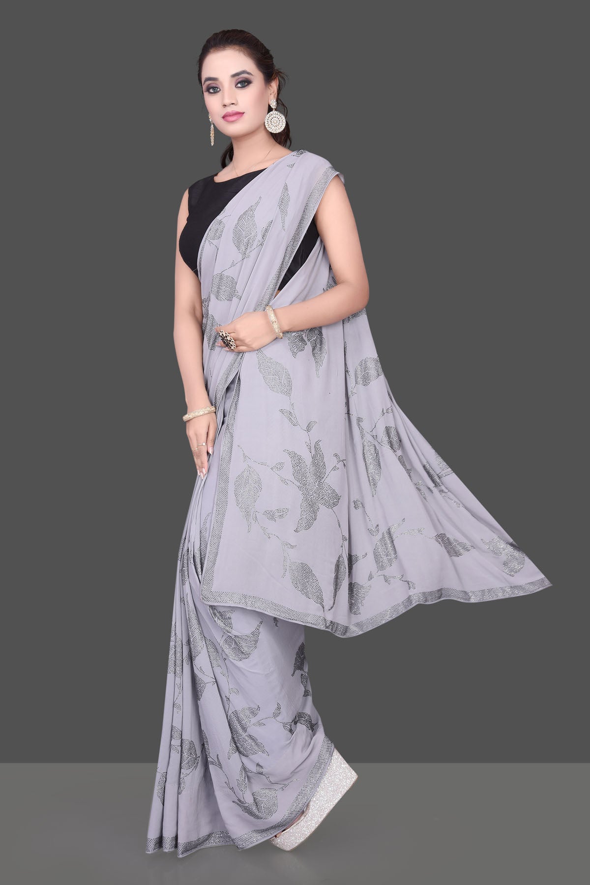 Shop gorgeous grey stone work georgette saree online in USA. Be the talk of the parties and special occasions with stunning embroidered sarees, designer sarees, pure silk saris, Bollywood sarees from Pure Elegance Indian fashion store in USA.-pallu