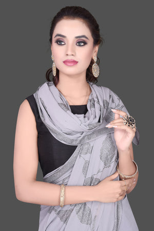 Shop gorgeous grey stone work georgette saree online in USA. Be the talk of the parties and special occasions with stunning embroidered sarees, designer sarees, pure silk saris, Bollywood sarees from Pure Elegance Indian fashion store in USA.-closeup
