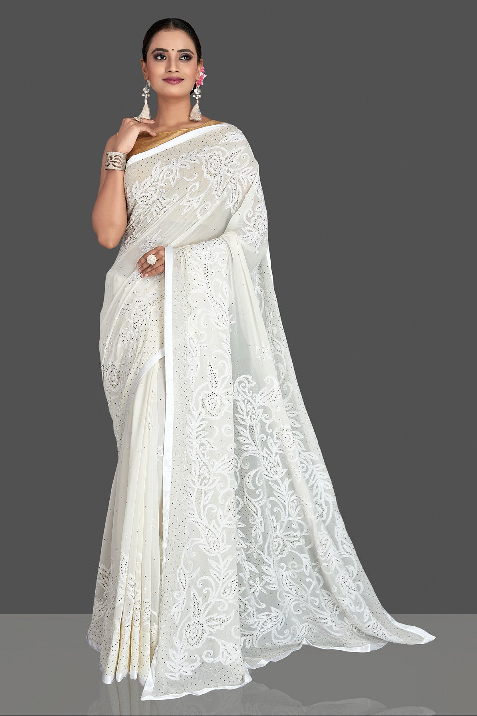 Buy stunning off-white Lucknowi chikankari georgette saree online in USA. Flaunt your sartorial choice with beautiful embroidered sarees, handwoven saris, georgette sarees, pure silk sarees from Pure Elegance Indian saree store in USA.-front