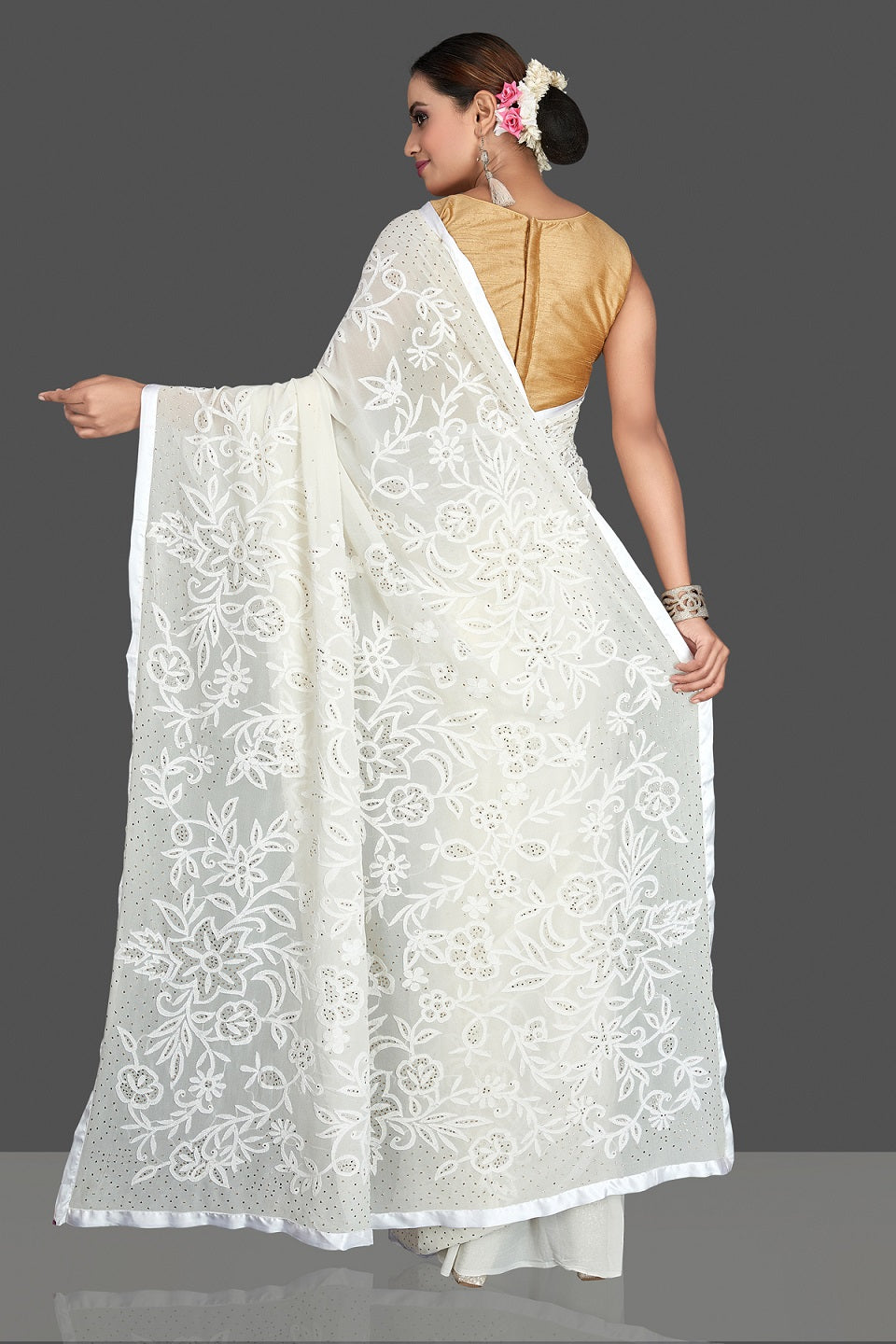 Shop beautiful off-white Lucknowi chikankari georgette sari online in USA. Flaunt your sartorial choice with beautiful embroidered sarees, handwoven sarees, georgette sarees, pure silk sarees from Pure Elegance Indian saree store in USA.-back