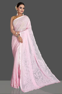 Buy gorgeous light pink Lucknowi chikankari work georgette saree online in USA. Flaunt your sartorial choice with beautiful embroidered sarees, handwoven sarees, georgette sarees, pure silk sarees from Pure Elegance Indian saree store in USA.-full view