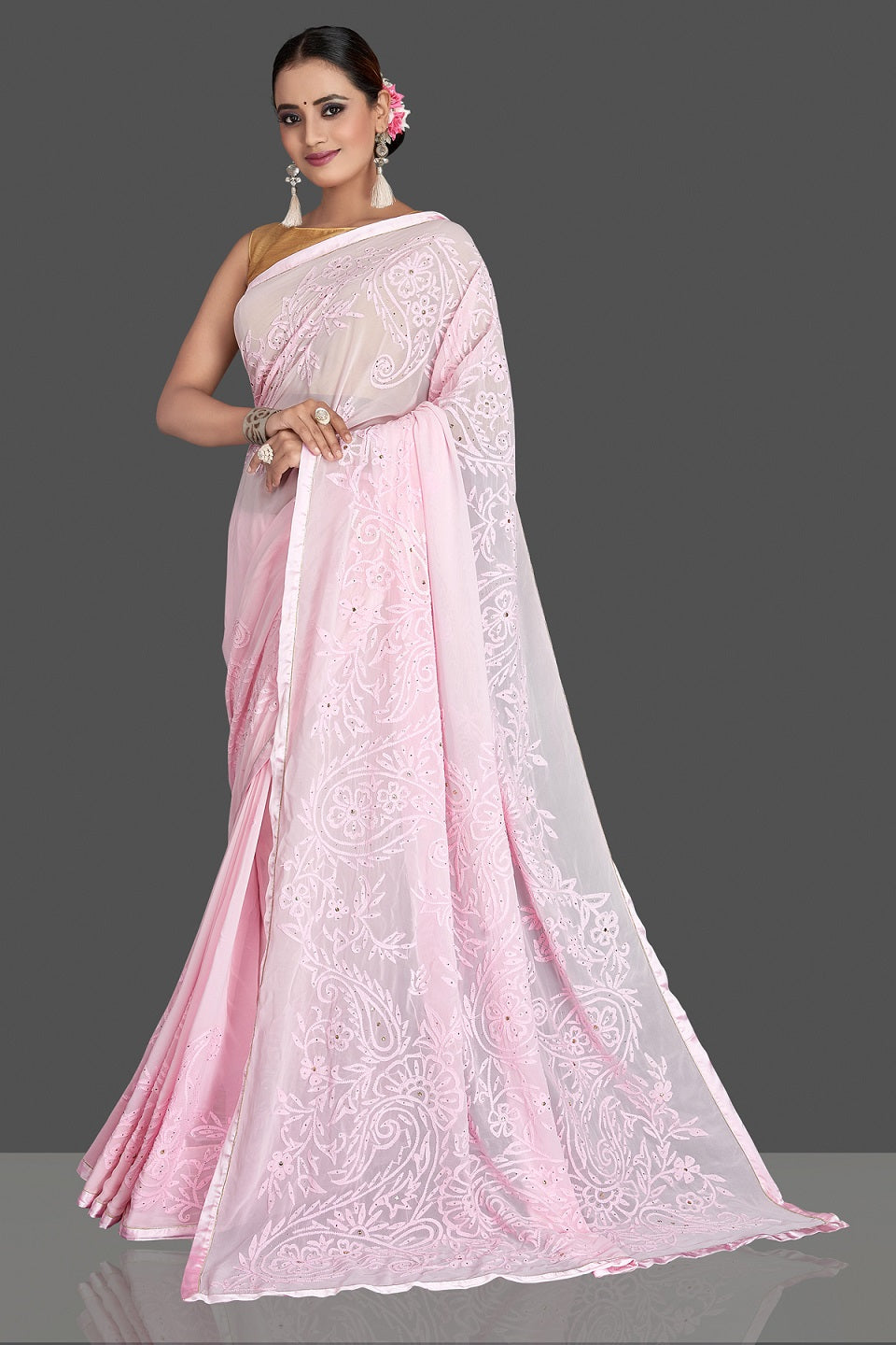 Buy gorgeous light pink Lucknowi chikankari work georgette saree online in USA. Flaunt your sartorial choice with beautiful embroidered sarees, handwoven sarees, georgette sarees, pure silk sarees from Pure Elegance Indian saree store in USA.-front