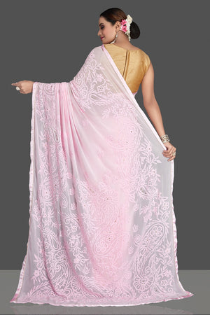 Buy gorgeous light pink Lucknowi chikankari work georgette saree online in USA. Flaunt your sartorial choice with beautiful embroidered sarees, handwoven sarees, georgette sarees, pure silk sarees from Pure Elegance Indian saree store in USA.-back