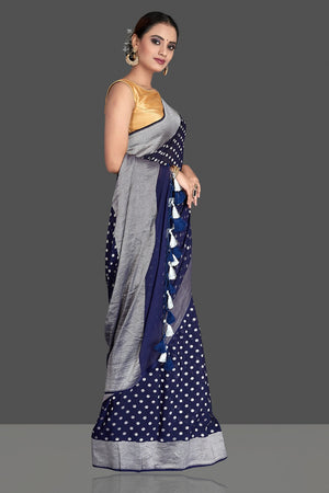 Buy beautiful dark blue georgette Banarasi saree online in USA with silver zari border and buta. Elevate your traditional style with beautiful Banarasi sarees, designer sarees, pure silk sarees, handwoven saris from Pure Elegance Indian saree store in USA.-side