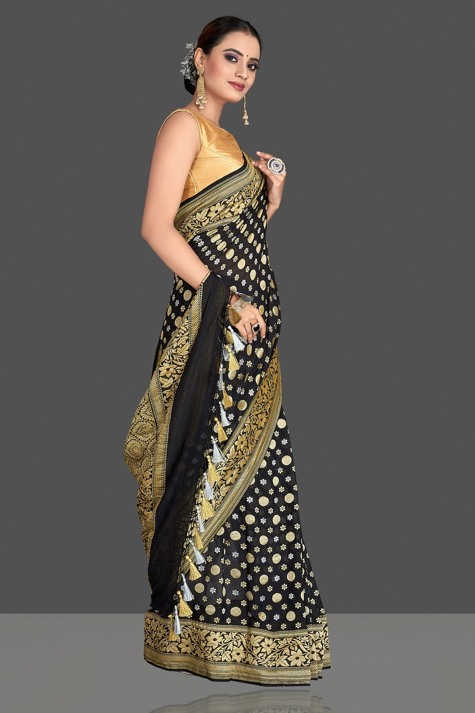 Buy beautiful black georgette Banarasi saree online in USA with golden zari work. Elevate your traditional style with beautiful Banarasi sarees, designer sarees, pure silk sarees, handwoven saris from Pure Elegance Indian saree store in USA.-right