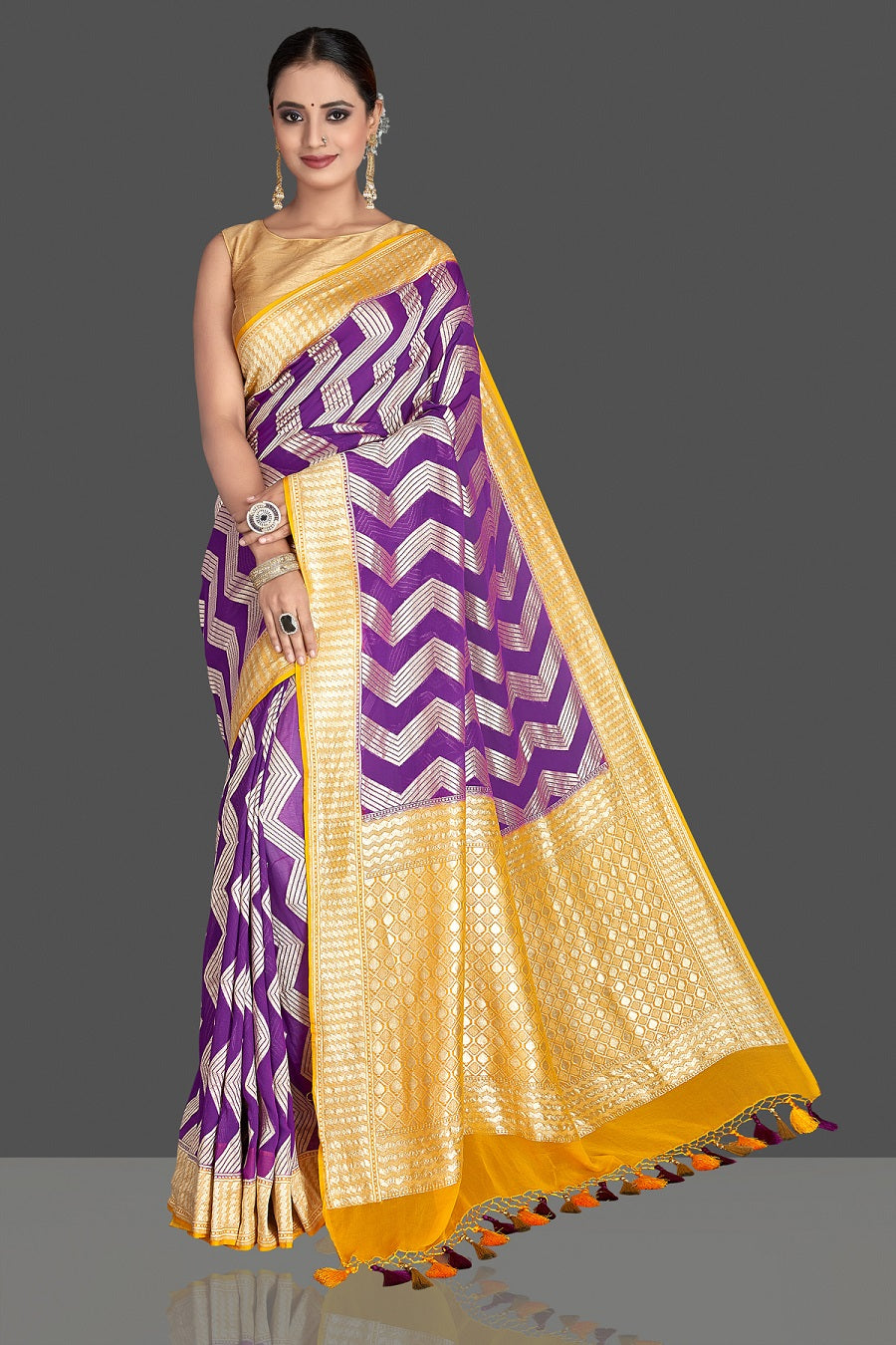 Buy beautiful purple georgette Banarasi saree online in USA with yellow zari border. Elevate your traditional style with beautiful Banarasi sarees, designer sarees, pure silk sarees, handwoven saris from Pure Elegance Indian saree store in USA.-full view