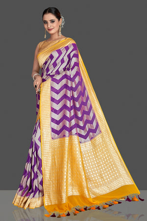Buy beautiful purple georgette Banarasi saree online in USA with yellow zari border. Elevate your traditional style with beautiful Banarasi sarees, designer sarees, pure silk sarees, handwoven saris from Pure Elegance Indian saree store in USA.-pallu