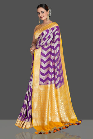 Buy beautiful purple georgette Banarasi saree online in USA with yellow zari border. Elevate your traditional style with beautiful Banarasi sarees, designer sarees, pure silk sarees, handwoven saris from Pure Elegance Indian saree store in USA.-side