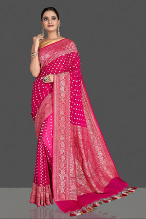 Buy attractive pink georgette Banarasi saree online in USA with silver zari border. Elevate your traditional style with beautiful Banarasi sarees, designer sarees, pure silk sarees, handwoven saris from Pure Elegance Indian saree store in USA.-front