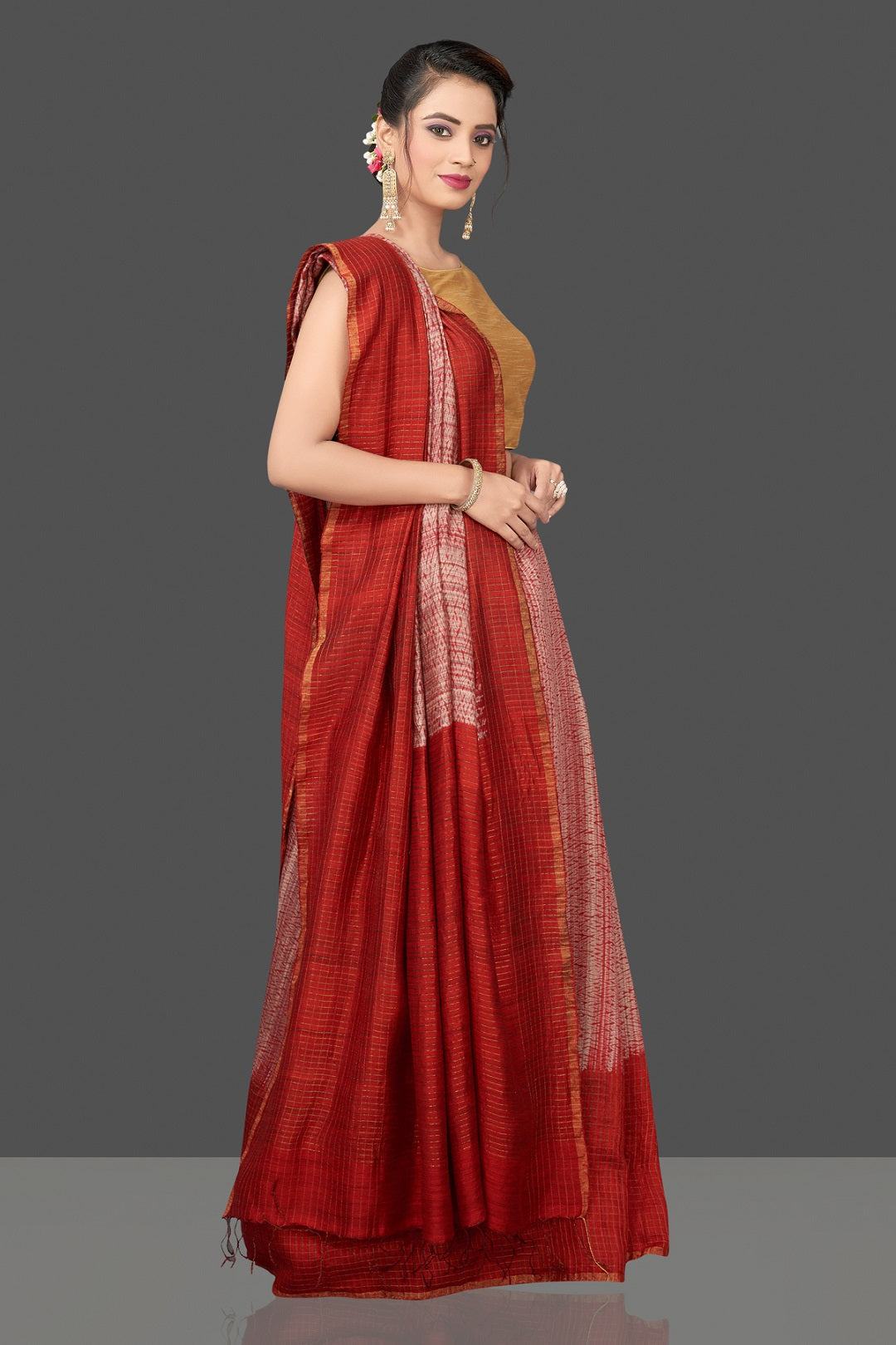 Buy stunning pink and red matka shibori saree online in USA with check zari border. Flaunt Indian fashion in USA with a stunning collection of handwoven sarees, cotton sarees, pure silk sarees, printed saris in USA from Pure Elegance Indian saree store in USA.-pallu