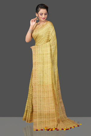 Shops stunning lime green striped Ketia saree online in USA. Flaunt Indian fashion in USA with a stunning collection of handwoven sarees, cotton saris, pure silk sarees, printed saris in USA from Pure Elegance Indian saree store in USA.-pallu