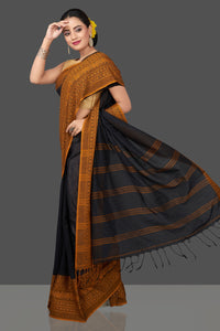 Shop gorgeous black Dongria cotton saree online in USA with mustard weave border. Flaunt Indian fashion in USA with a stunning collection of handwoven sarees, cotton saris, pure silk sarees, printed saris in USA from Pure Elegance Indian saree store in USA.-full view