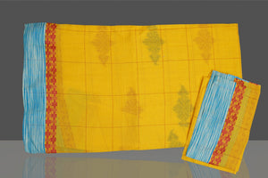 Shop stunning yellow cotton saree online in USA with blue border. Flaunt Indian fashion in USA with a stunning collection of handwoven sarees, cotton saris, pure silk sarees, printed saris in USA from Pure Elegance Indian saree store in USA.-blouse