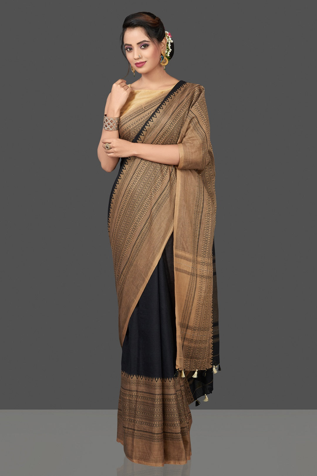 Shop gorgeous black cotton sari online in USA with beige weave border. Flaunt Indian fashion in USA with a stunning collection of handwoven sarees, cotton saris, pure silk sarees, printed saris in USA from Pure Elegance Indian saree store in USA.-full view
