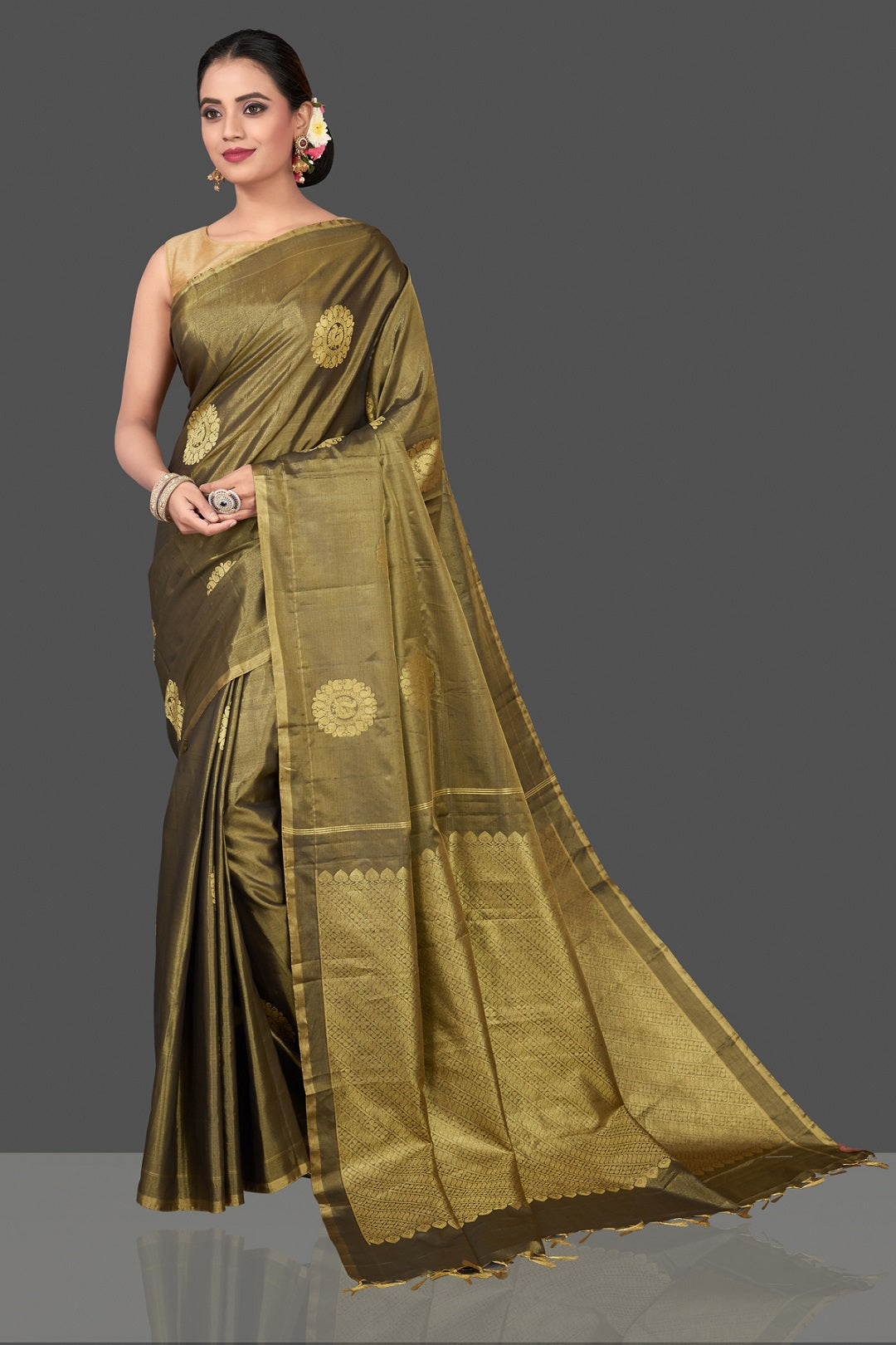 Buy gorgeous olive green handloom borderless Kanjivaram silk saree online in USA with golden zari buta. Be the center of attraction at weddings and festive occasions in the stunning handwoven silk sarees, Kanchipuram silk sarees, zari work sarees, Banarasi sarees from Pure Elegance Indian saree store in USA.-full view