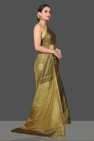 Buy gorgeous olive green handloom borderless Kanjivaram silk saree online in USA with golden zari buta. Be the center of attraction at weddings and festive occasions in the stunning handwoven silk sarees, Kanchipuram silk sarees, zari work sarees, Banarasi sarees from Pure Elegance Indian saree store in USA.-side