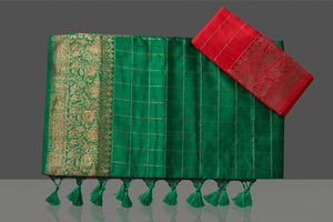 Buy gorgeous green tussar Banarasi sari online in USA with antique zari border. Go for stunning Indian designer sarees, georgette sarees, handwoven saris, embroidered sarees for festive occasions and weddings from Pure Elegance Indian clothing store in USA.-blouse