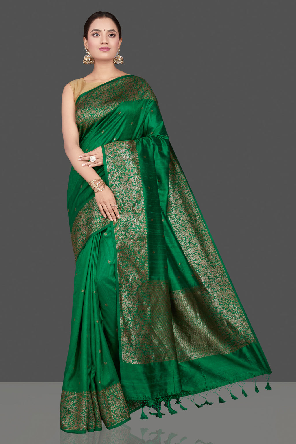 Buy gorgeous green tussar Banarasi sari online in USA with antique zari border. Go for stunning Indian designer sarees, georgette sarees, handwoven saris, embroidered sarees for festive occasions and weddings from Pure Elegance Indian clothing store in USA.-full view