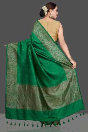 Buy gorgeous green tussar Banarasi sari online in USA with antique zari border. Go for stunning Indian designer sarees, georgette sarees, handwoven saris, embroidered sarees for festive occasions and weddings from Pure Elegance Indian clothing store in USA.-back