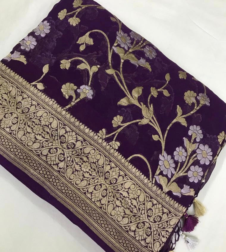 Shop beautiful purple georgette Banarasi saree online in USA. Make a fashion statement at weddings with stunning designer sarees, embroidered sarees with blouse, wedding sarees, handloom sarees from Pure Elegance Indian fashion store in USA.-front
