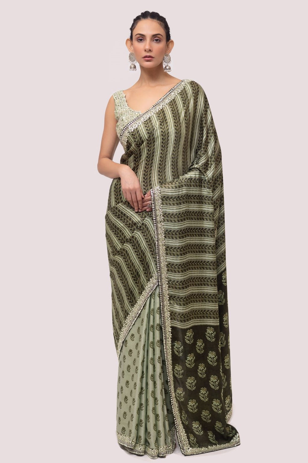 Shop beautiful olive green printed embroidered organza saree online in USA. Make a fashion statement on festive occasions and weddings with designer sarees, designer suits, Indian dresses, Anarkali suits, palazzo suits, designer gowns, sharara suits, embroidered sarees from Pure Elegance Indian fashion store in USA.-full view