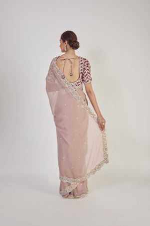 Buy beautiful dusty pink embroidered georgette saree online in USA with blouse. Make a fashion statement on festive occasions and weddings with designer sarees, designer suits, Indian dresses, Anarkali suits, palazzo suits, designer gowns, sharara suits, embroidered sarees from Pure Elegance Indian fashion store in USA.-back