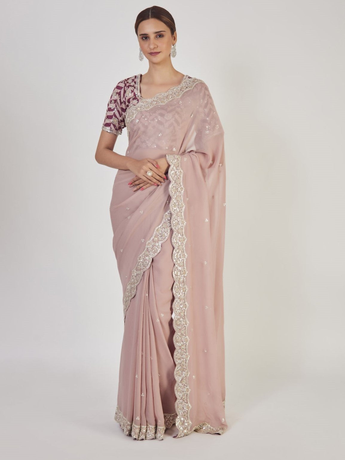 Buy beautiful dusty pink embroidered georgette saree online in USA with blouse. Make a fashion statement on festive occasions and weddings with designer sarees, designer suits, Indian dresses, Anarkali suits, palazzo suits, designer gowns, sharara suits, embroidered sarees from Pure Elegance Indian fashion store in USA.-full view