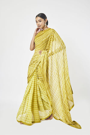 Buy beautiful mustard printed cutdana work georgette saree online in USA with blouse. Make a fashion statement on festive occasions and weddings with designer sarees, designer suits, Indian dresses, Anarkali suits, palazzo suits, designer gowns, sharara suits, embroidered sarees from Pure Elegance Indian fashion store in USA.-pallu