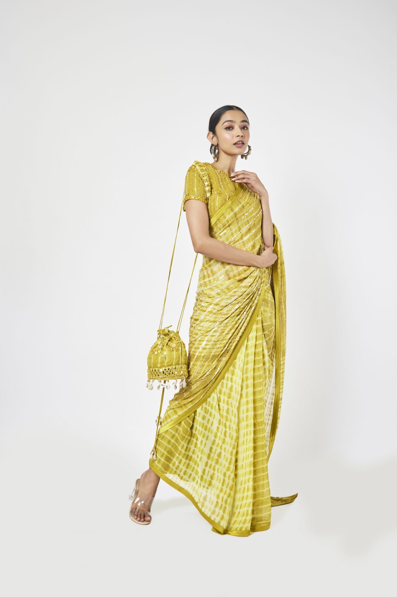 Buy beautiful mustard printed cutdana work georgette saree online in USA with blouse. Make a fashion statement on festive occasions and weddings with designer sarees, designer suits, Indian dresses, Anarkali suits, palazzo suits, designer gowns, sharara suits, embroidered sarees from Pure Elegance Indian fashion store in USA.-right