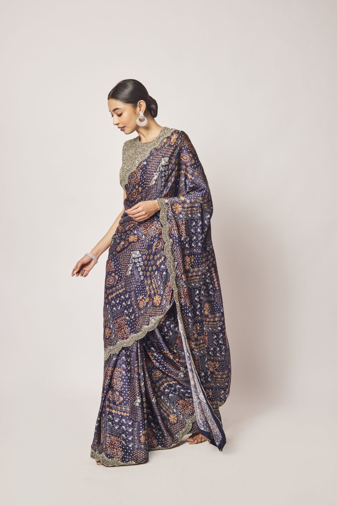 Shop stunning navy blue printed embroidered satin saree online in USA with blouse. Make a fashion statement on festive occasions and weddings with designer sarees, designer suits, Indian dresses, Anarkali suits, palazzo suits, designer gowns, sharara suits, embroidered sarees from Pure Elegance Indian fashion store in USA.-pallu