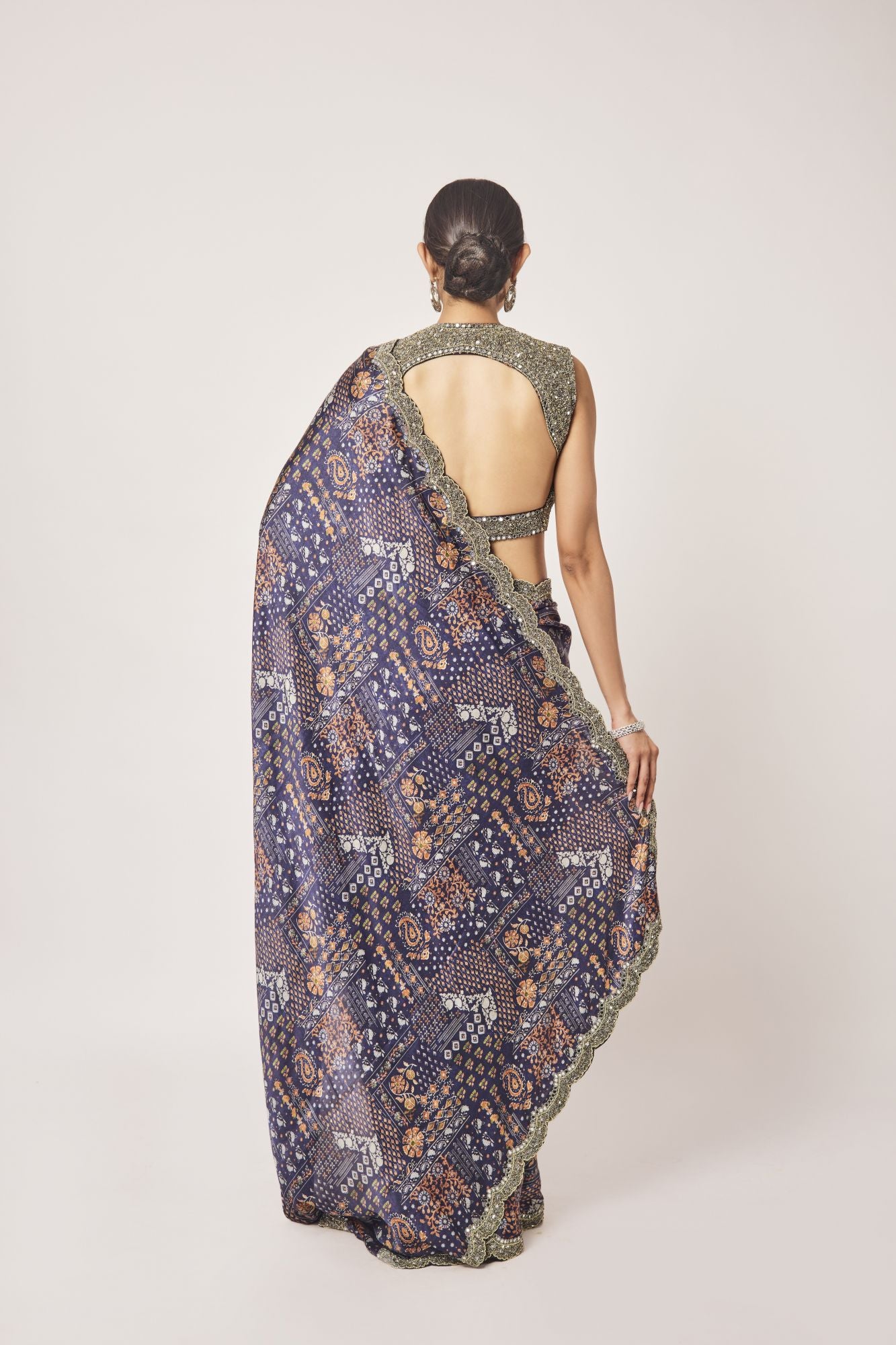 Shop stunning navy blue printed embroidered satin saree online in USA with blouse. Make a fashion statement on festive occasions and weddings with designer sarees, designer suits, Indian dresses, Anarkali suits, palazzo suits, designer gowns, sharara suits, embroidered sarees from Pure Elegance Indian fashion store in USA.-back