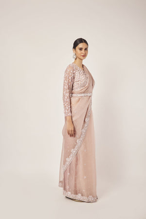 Shop dusty pink embroidered organza saree online in USA with blouse. Make a fashion statement on festive occasions and weddings with designer sarees, designer suits, Indian dresses, Anarkali suits, palazzo suits, designer gowns, sharara suits, embroidered sarees from Pure Elegance Indian fashion store in USA.-side