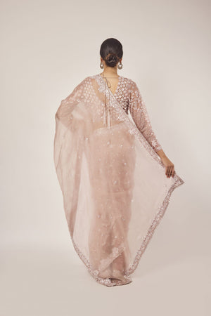 Shop dusty pink embroidered organza saree online in USA with blouse. Make a fashion statement on festive occasions and weddings with designer sarees, designer suits, Indian dresses, Anarkali suits, palazzo suits, designer gowns, sharara suits, embroidered sarees from Pure Elegance Indian fashion store in USA.-back