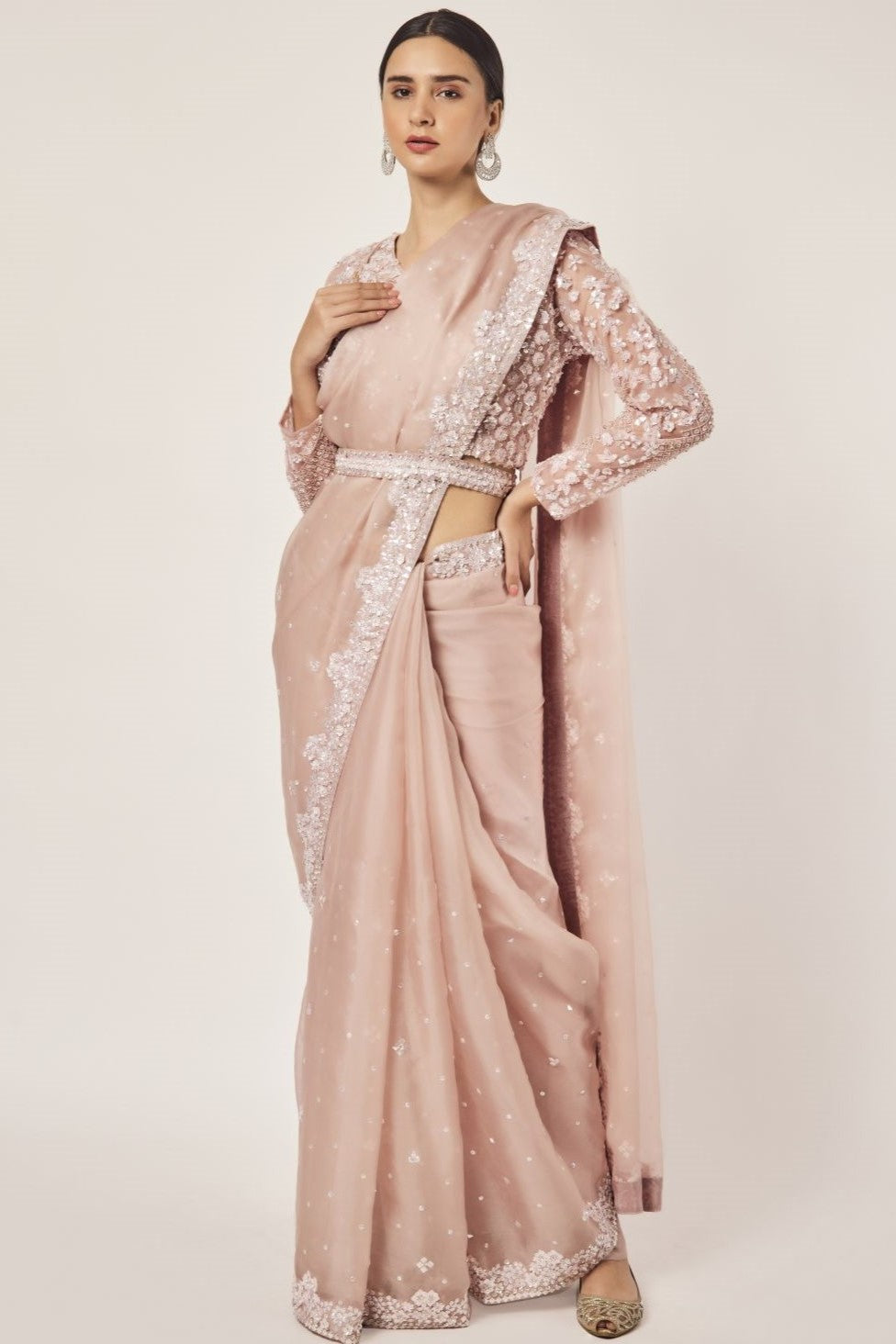 Shop dusty pink embroidered organza saree online in USA with blouse. Make a fashion statement on festive occasions and weddings with designer sarees, designer suits, Indian dresses, Anarkali suits, palazzo suits, designer gowns, sharara suits, embroidered sarees from Pure Elegance Indian fashion store in USA.-full view