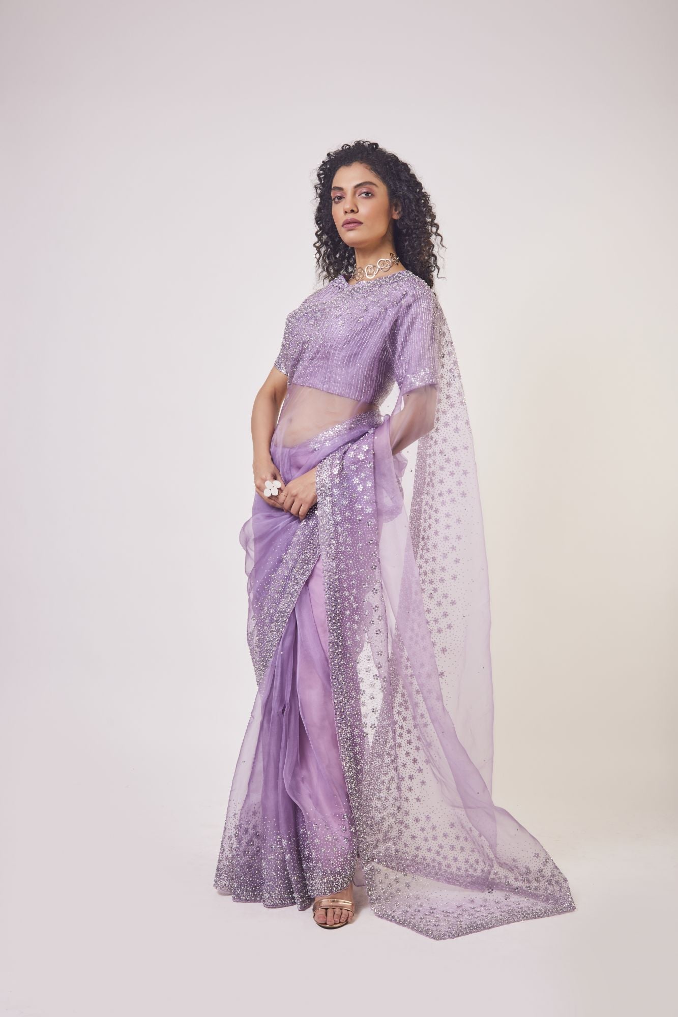 Buy beautiful lavender embroidered organza saree online in USA with saree blouse. Make a fashion statement on festive occasions and weddings with designer sarees, designer suits, Indian dresses, Anarkali suits, palazzo suits, designer gowns, sharara suits, embroidered sarees from Pure Elegance Indian fashion store in USA.-pallu