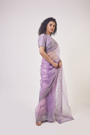 Buy beautiful lavender embroidered organza saree online in USA with saree blouse. Make a fashion statement on festive occasions and weddings with designer sarees, designer suits, Indian dresses, Anarkali suits, palazzo suits, designer gowns, sharara suits, embroidered sarees from Pure Elegance Indian fashion store in USA.-right