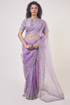 Buy beautiful lavender embroidered organza saree online in USA with saree blouse. Make a fashion statement on festive occasions and weddings with designer sarees, designer suits, Indian dresses, Anarkali suits, palazzo suits, designer gowns, sharara suits, embroidered sarees from Pure Elegance Indian fashion store in USA.-full view