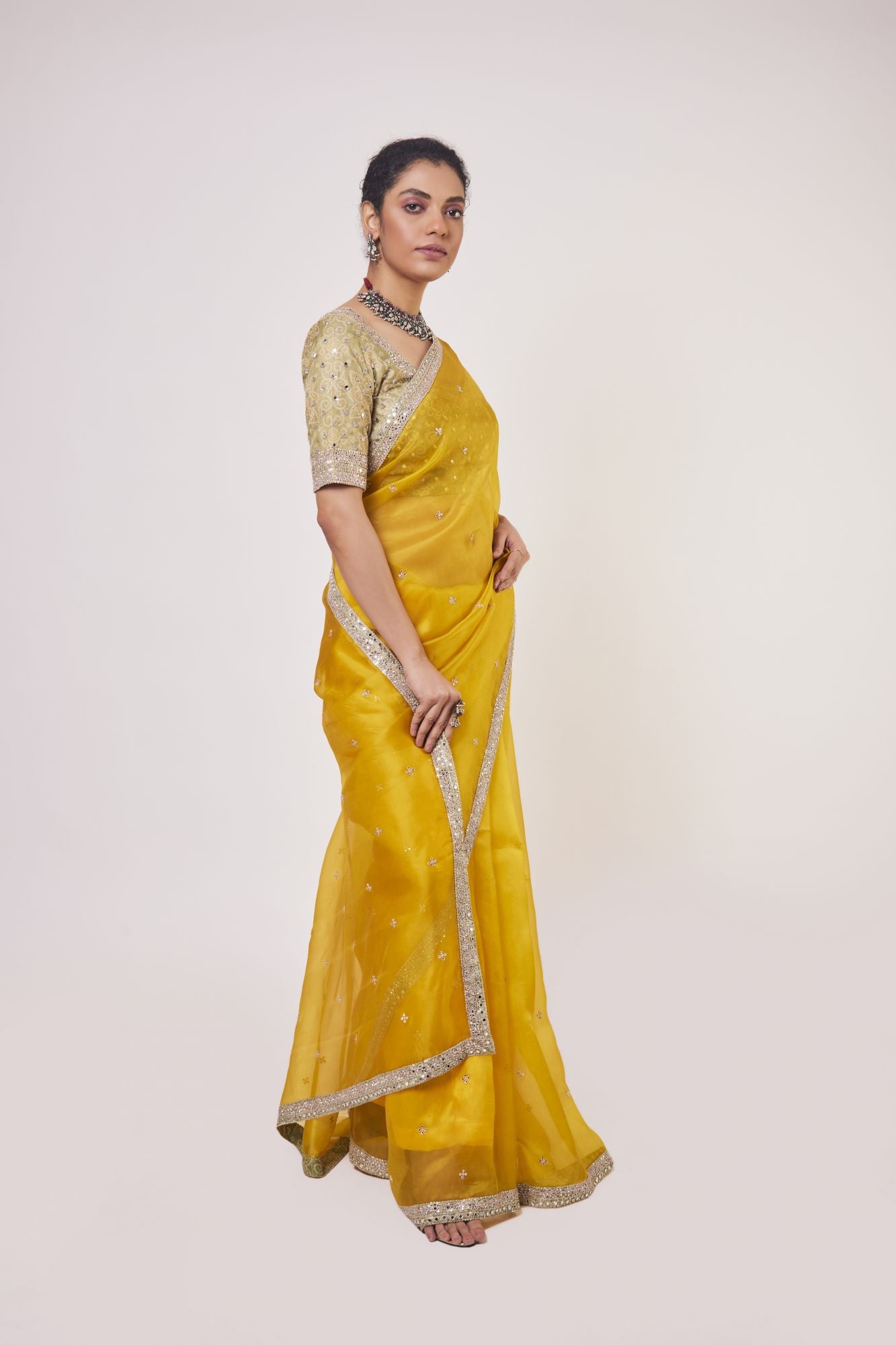 Buy stunning mustard embroidered organza saree online in USA with golden saree blouse. Make a fashion statement on festive occasions and weddings with designer sarees, designer suits, Indian dresses, Anarkali suits, palazzo suits, designer gowns, sharara suits, embroidered sarees from Pure Elegance Indian fashion store in USA.-right