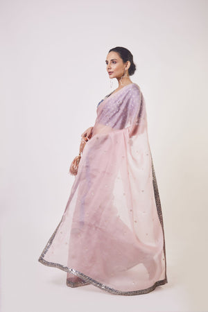Shop powder pink embroidered organza saree online in USA with blue embroidered saree blouse. Make a fashion statement on festive occasions and weddings with designer sarees, designer suits, Indian dresses, Anarkali suits, palazzo suits, designer gowns, sharara suits, embroidered sarees from Pure Elegance Indian fashion store in USA.-pallu