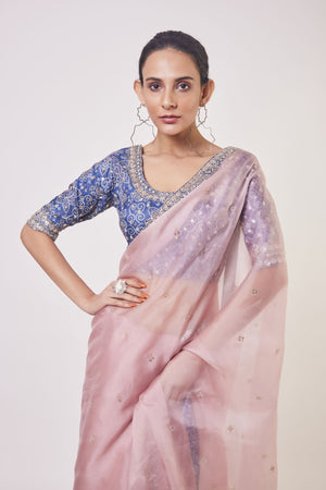 Shop powder pink embroidered organza saree online in USA with blue embroidered saree blouse. Make a fashion statement on festive occasions and weddings with designer sarees, designer suits, Indian dresses, Anarkali suits, palazzo suits, designer gowns, sharara suits, embroidered sarees from Pure Elegance Indian fashion store in USA.-closeup