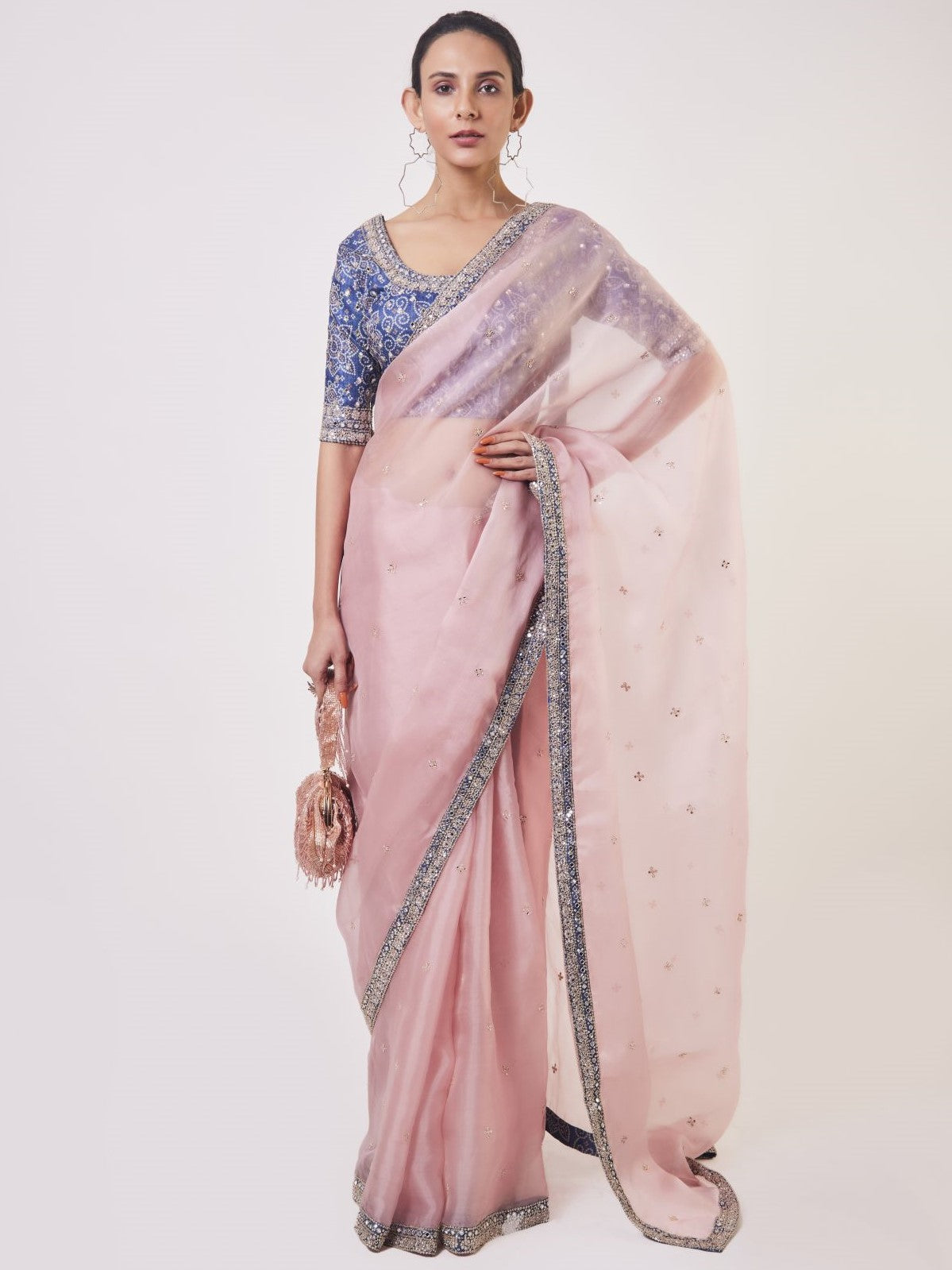 Shop powder pink embroidered organza saree online in USA with blue embroidered saree blouse. Make a fashion statement on festive occasions and weddings with designer sarees, designer suits, Indian dresses, Anarkali suits, palazzo suits, designer gowns, sharara suits, embroidered sarees from Pure Elegance Indian fashion store in USA.-full view