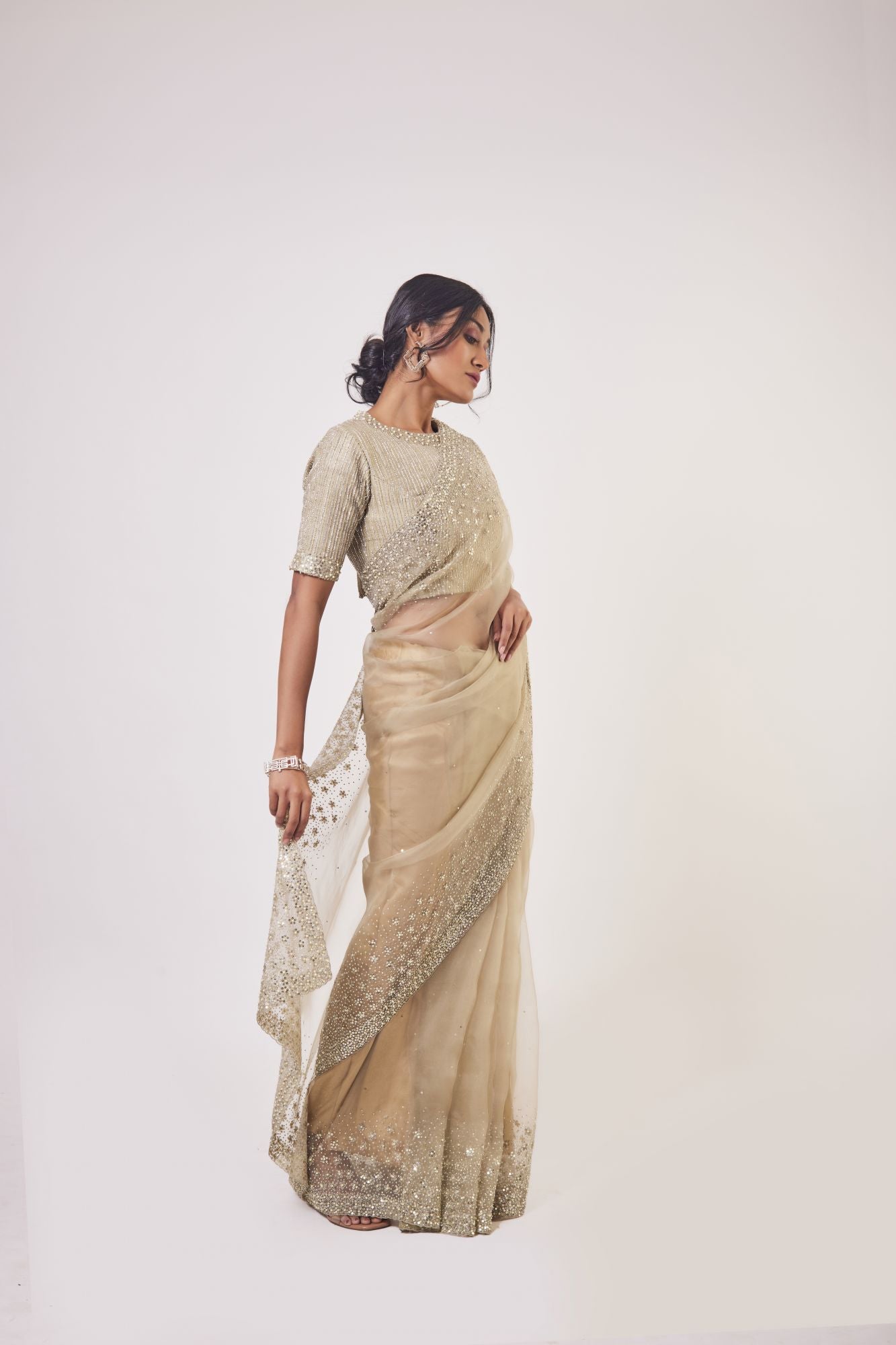 Buy beige embroidered organza saree online in USA with embroidered saree blouse. Make a fashion statement on festive occasions and weddings with designer sarees, designer suits, Indian dresses, Anarkali suits, palazzo suits, designer gowns, sharara suits, embroidered sarees from Pure Elegance Indian fashion store in USA.-right