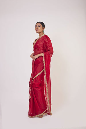 Shop red embroidered organza saree online in USA with designer saree blouse. Make a fashion statement on festive occasions and weddings with designer sarees, designer suits, Indian dresses, Anarkali suits, palazzo suits, designer gowns, sharara suits, embroidered sarees from Pure Elegance Indian fashion store in USA.-side